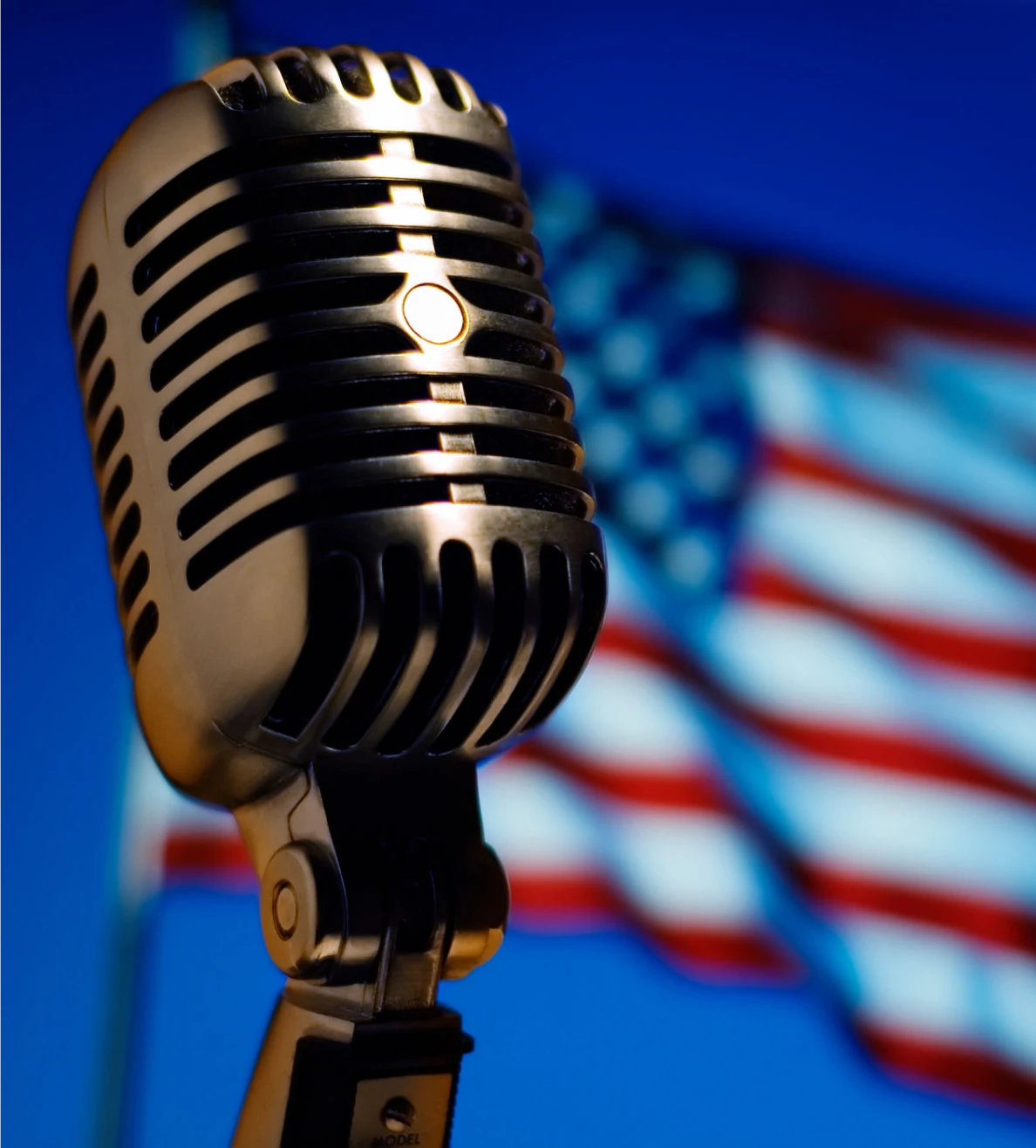 Vintage microphone with American flag background